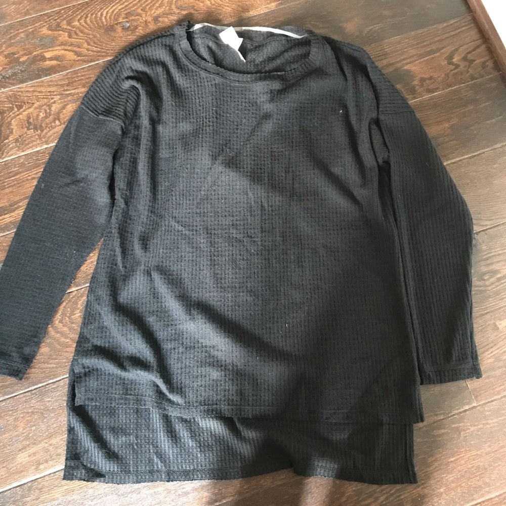 Brenda’s long black waffle knit sweater size M